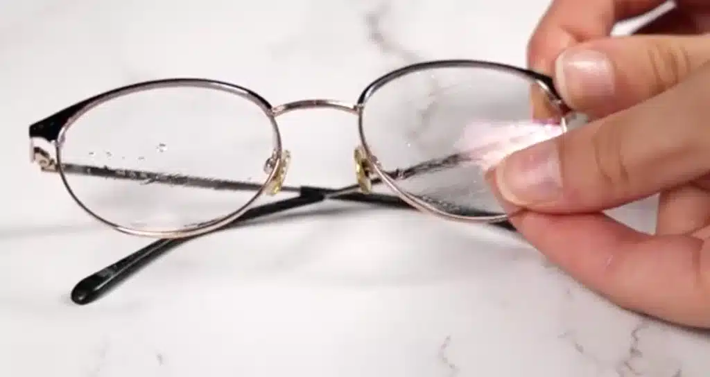 Rubbing lenses with soap