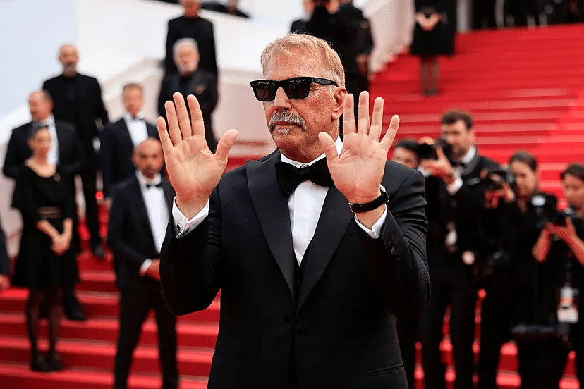 Kevin Costner wears Oliver peoples