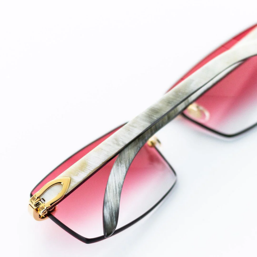 Cartier buffalo horn glasses with rose lenses