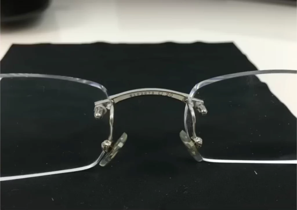 A genuine pair of Cartier glasses with a serial number and bridge size