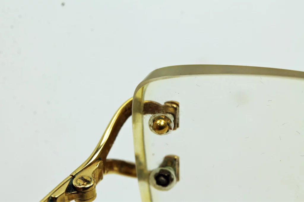 Worn out screw on Cartier glasses