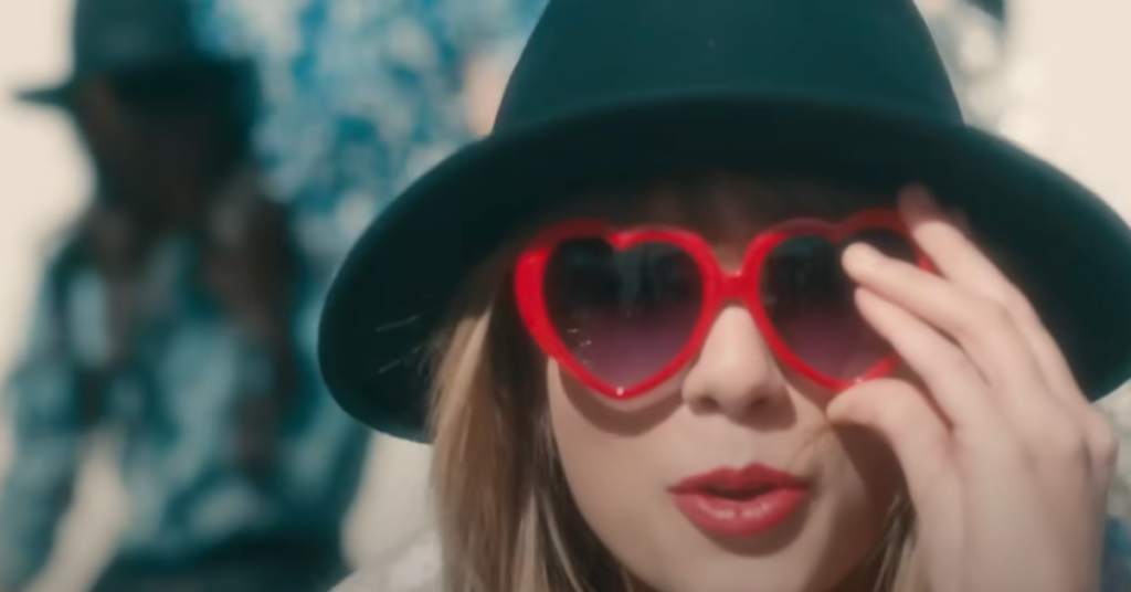 taylor swift in heart sunglasses