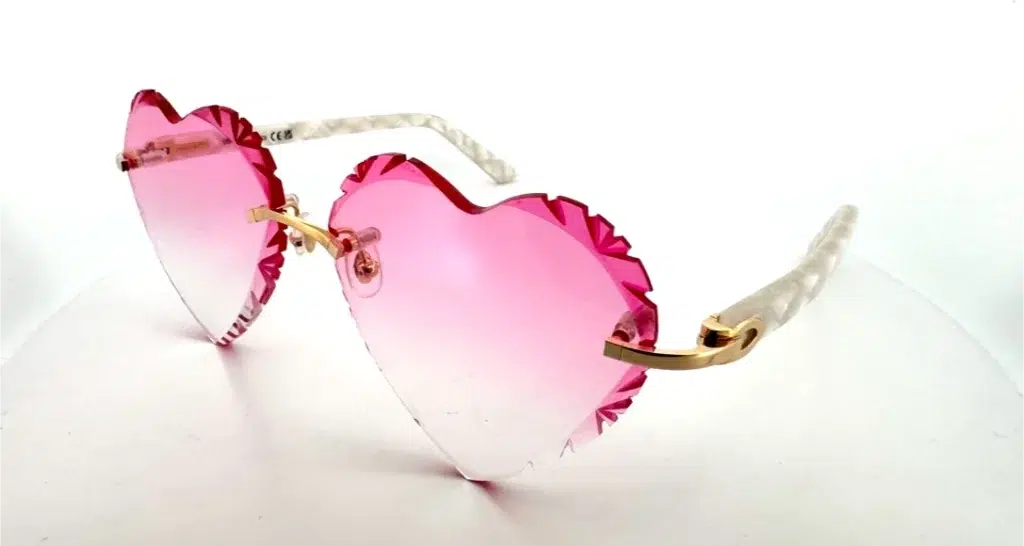 Cartier heart-shaped sunglasses with pink lenses