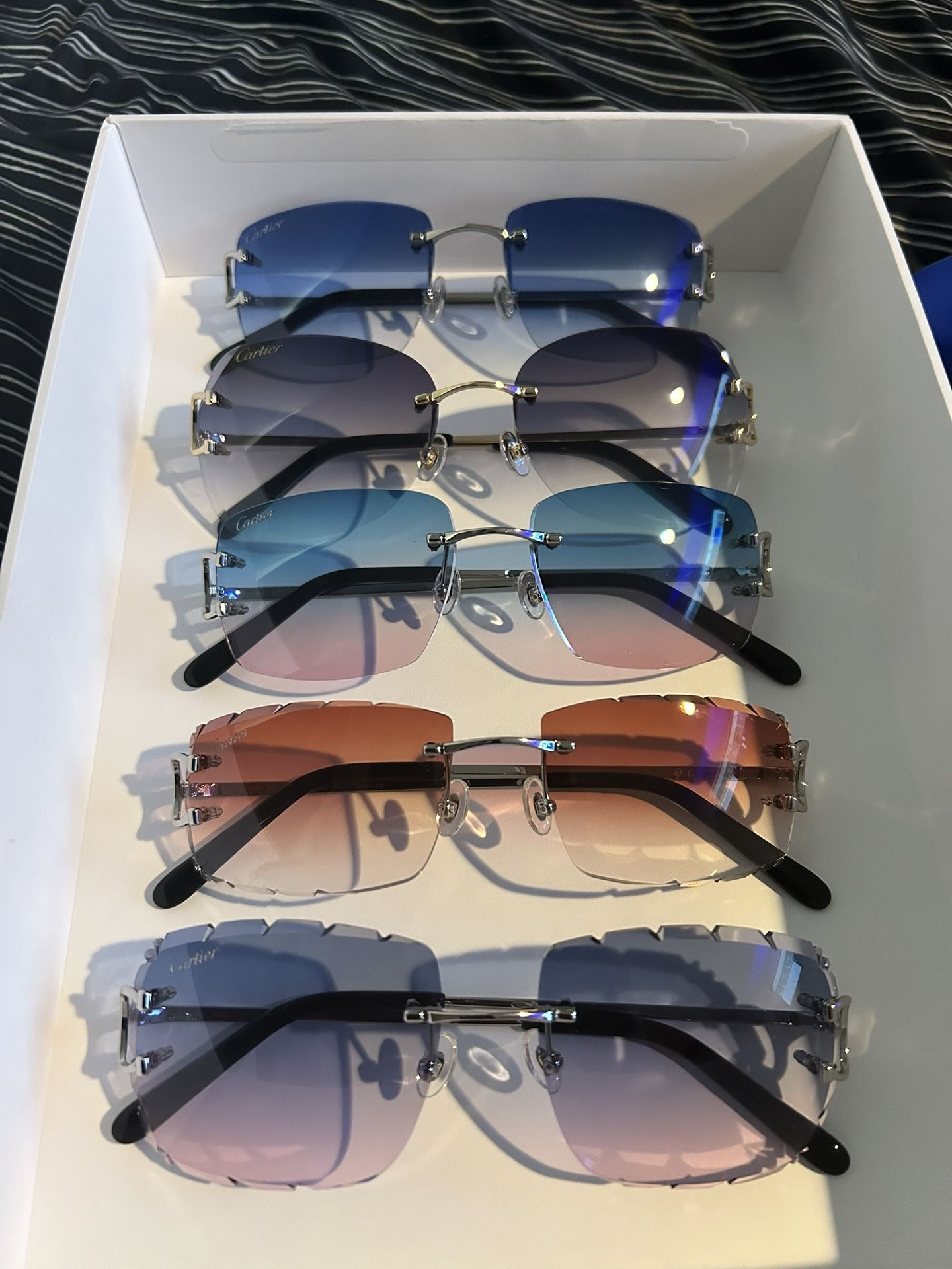 Cartier glasses with colorful lenses