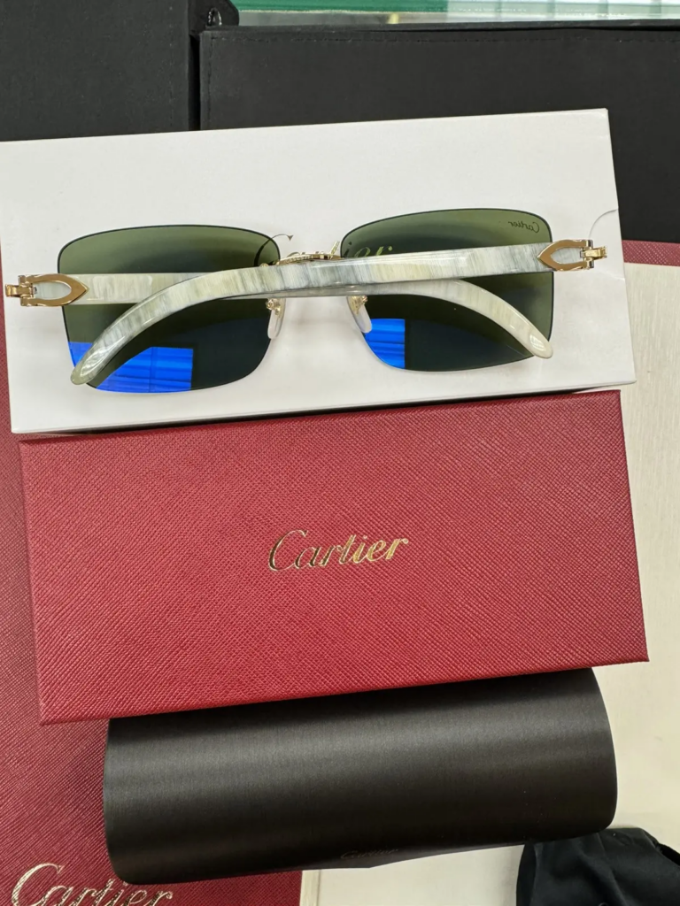 White buffs by Cartier